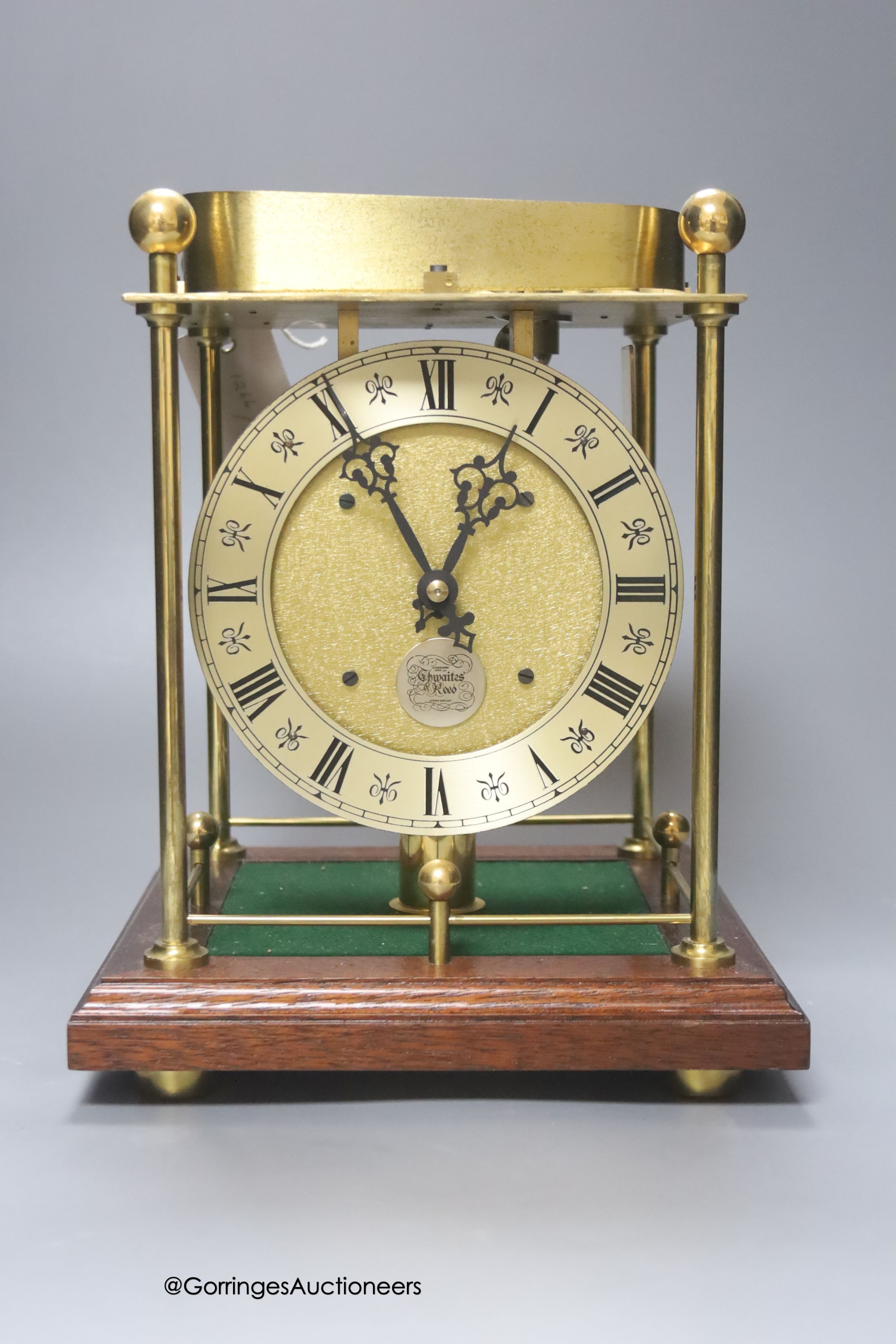 A Thwaites & Reed rolling ball timepiece, height 27cm